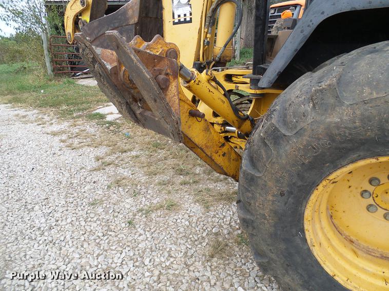 image for item DE5267 1999 John Deere 310E backhoe