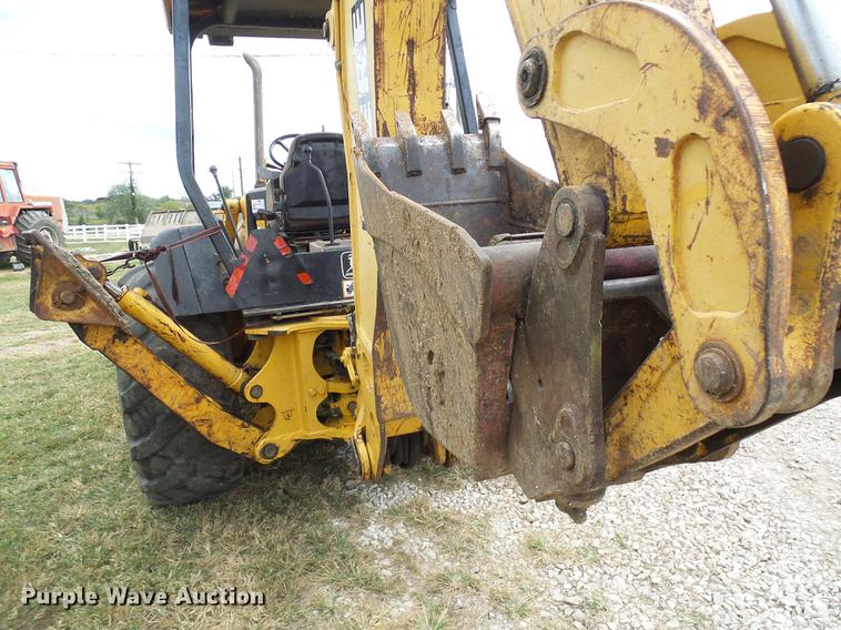 image for item DE5267 1999 John Deere 310E backhoe