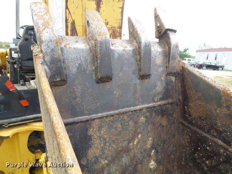 image for item DE5267 1999 John Deere 310E backhoe