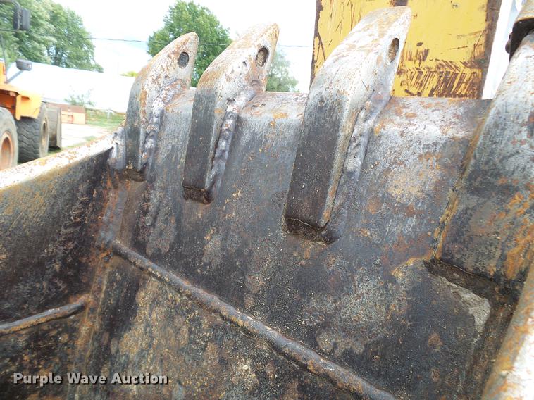 image for item DE5267 1999 John Deere 310E backhoe