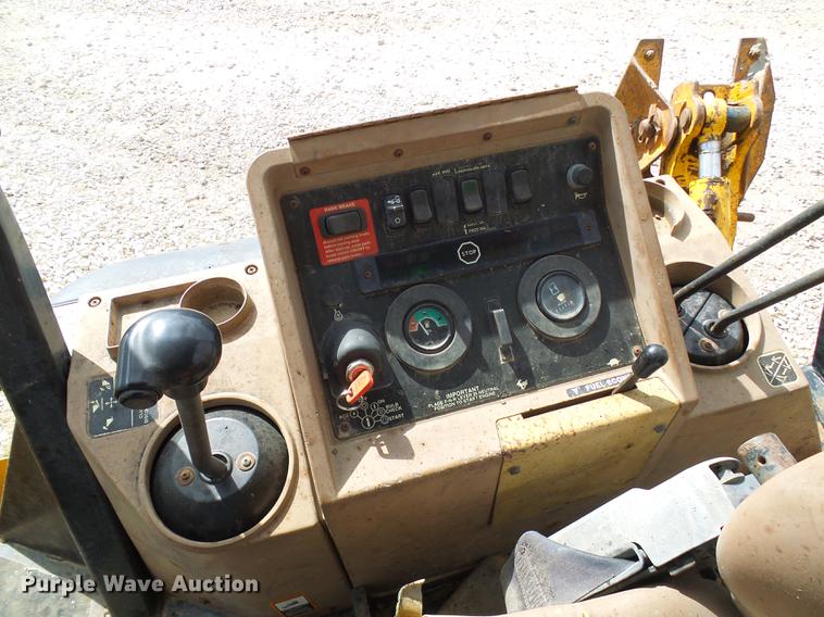 image for item DE5267 1999 John Deere 310E backhoe