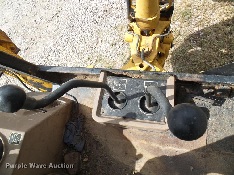 image for item DE5267 1999 John Deere 310E backhoe