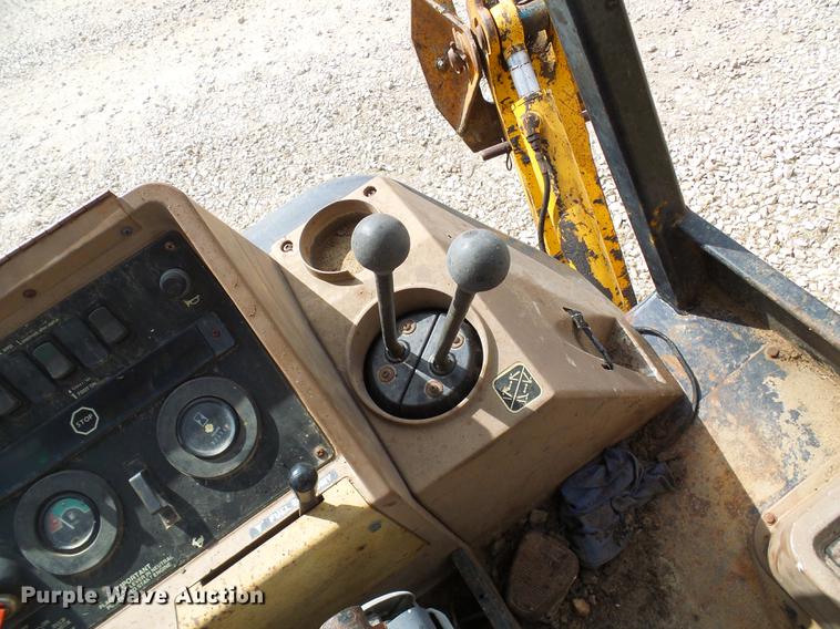 image for item DE5267 1999 John Deere 310E backhoe