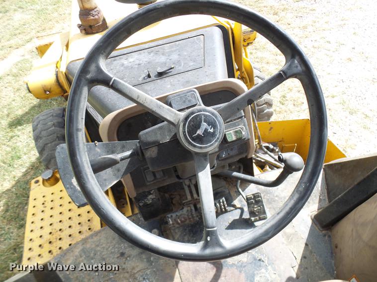 image for item DE5267 1999 John Deere 310E backhoe