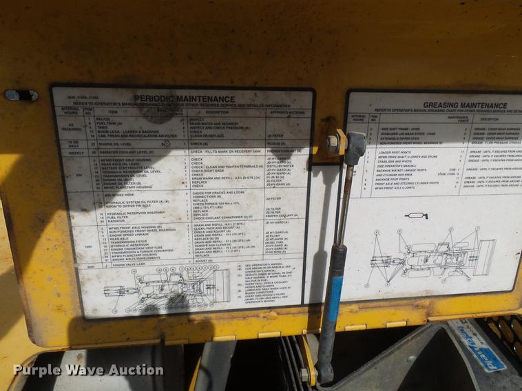 image for item DE5267 1999 John Deere 310E backhoe