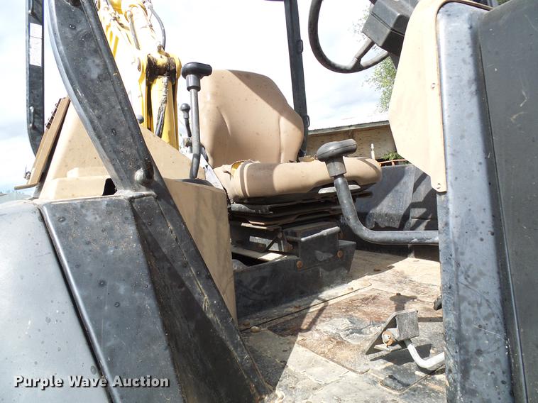 image for item DE5267 1999 John Deere 310E backhoe