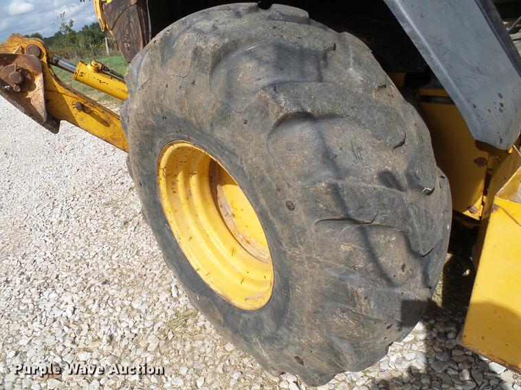 image for item DE5267 1999 John Deere 310E backhoe