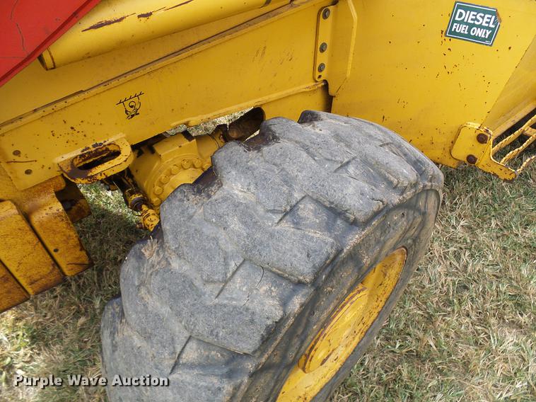 image for item DE5267 1999 John Deere 310E backhoe