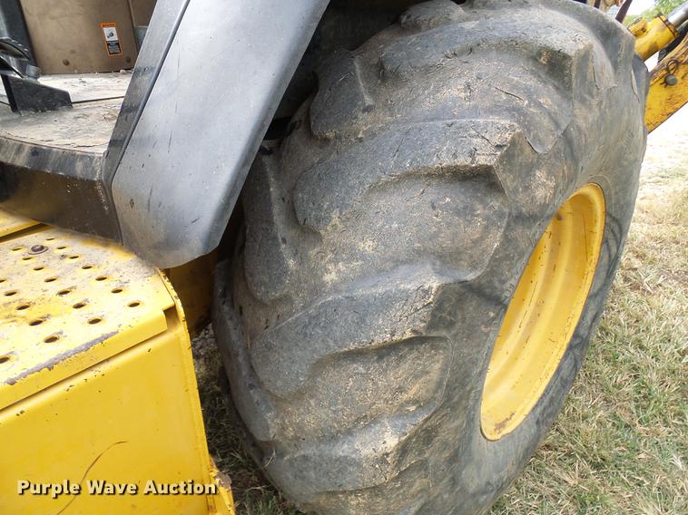 image for item DE5267 1999 John Deere 310E backhoe