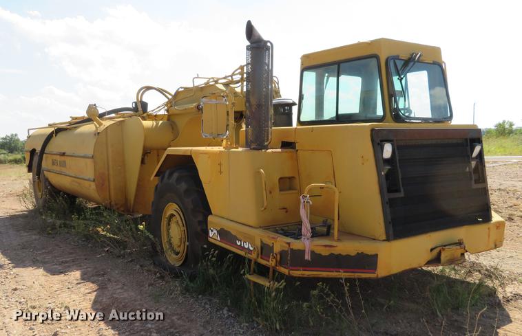 image for item DE6417 Caterpillar 615C water wagon