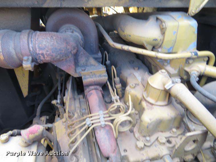 image for item DE6417 Caterpillar 615C water wagon