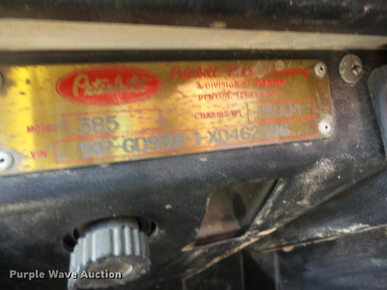 image for item DF1264 1999 Peterbilt 385 roll off container truck