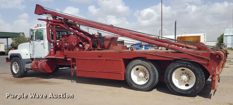 image for item EI9663 2004 Mack RD690SX flatbed winch truck