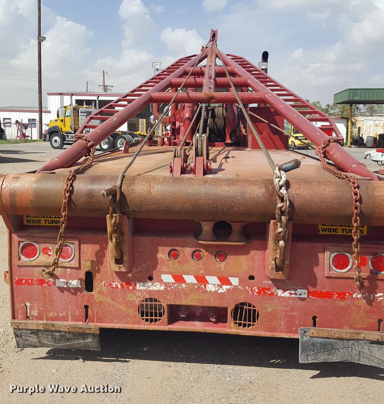 image for item EI9663 2004 Mack RD690SX flatbed winch truck