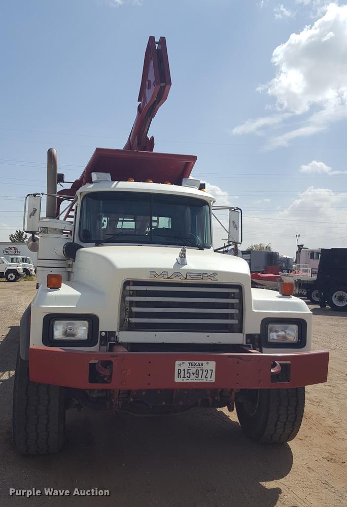 image for item EI9663 2004 Mack RD690SX flatbed winch truck