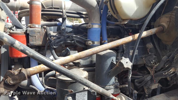 image for item EI9663 2004 Mack RD690SX flatbed winch truck