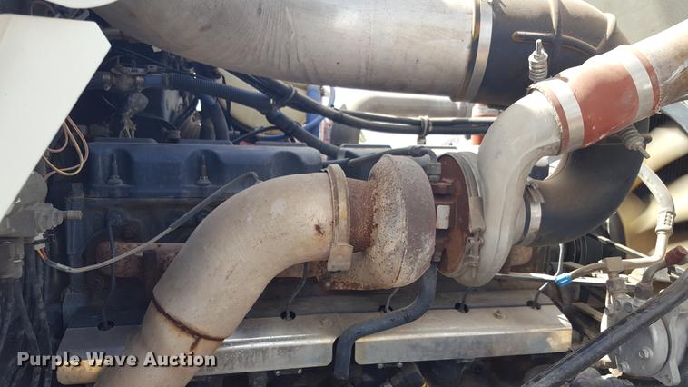 image for item EI9663 2004 Mack RD690SX flatbed winch truck