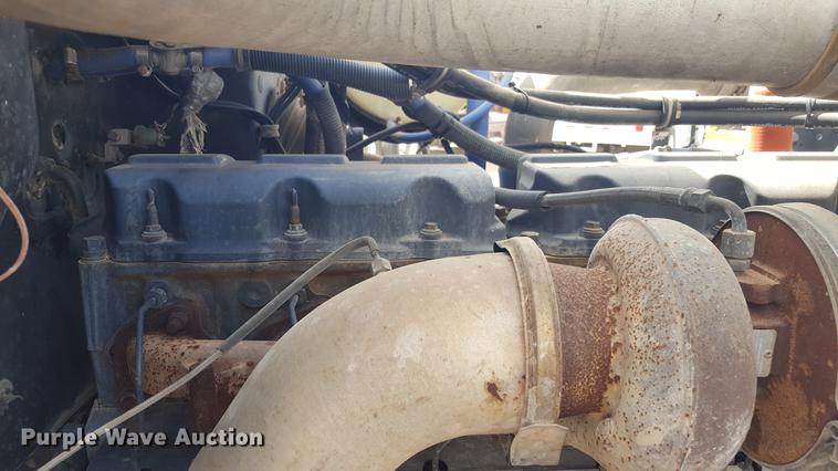 image for item EI9663 2004 Mack RD690SX flatbed winch truck