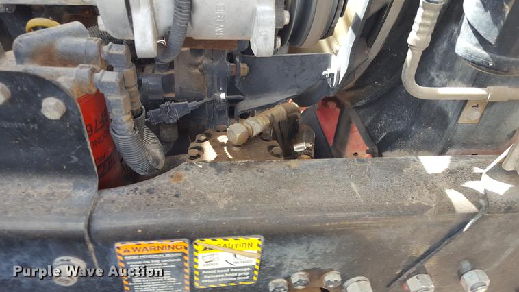 image for item EI9663 2004 Mack RD690SX flatbed winch truck