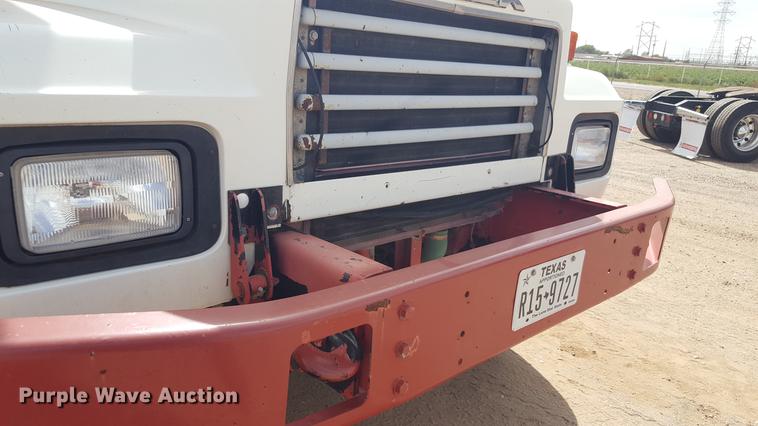 image for item EI9663 2004 Mack RD690SX flatbed winch truck