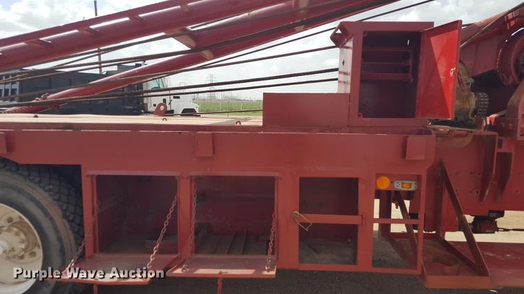 image for item EI9663 2004 Mack RD690SX flatbed winch truck