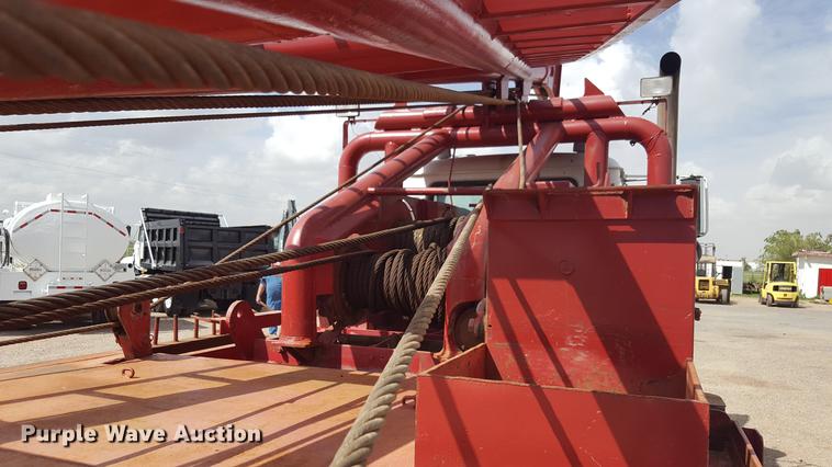 image for item EI9663 2004 Mack RD690SX flatbed winch truck