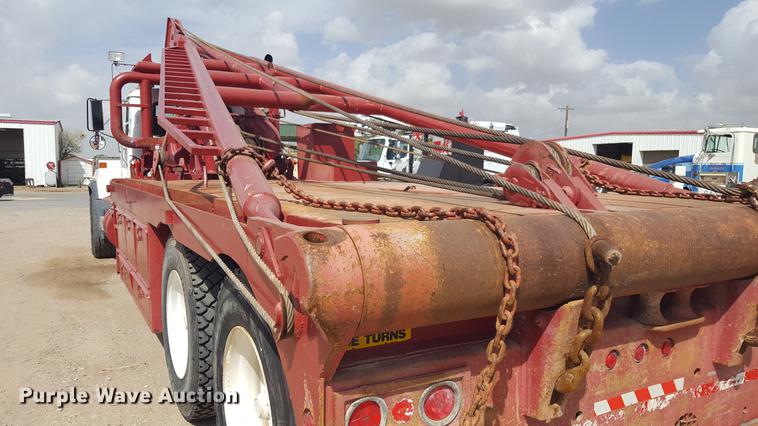 image for item EI9663 2004 Mack RD690SX flatbed winch truck