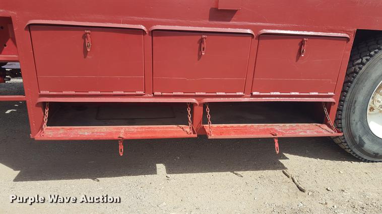 image for item EI9663 2004 Mack RD690SX flatbed winch truck