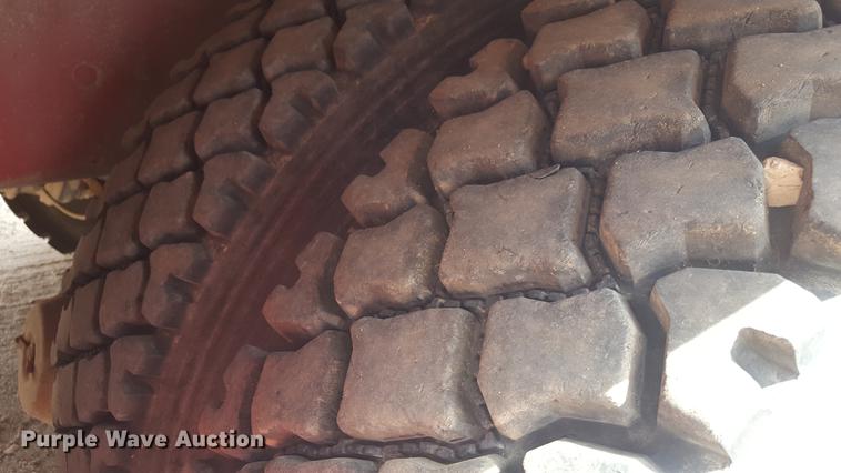 image for item EI9663 2004 Mack RD690SX flatbed winch truck