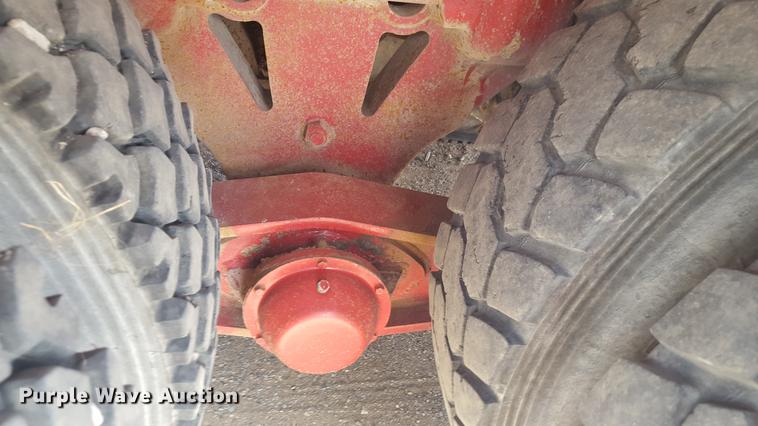 image for item EI9663 2004 Mack RD690SX flatbed winch truck