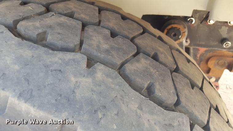 image for item EI9663 2004 Mack RD690SX flatbed winch truck