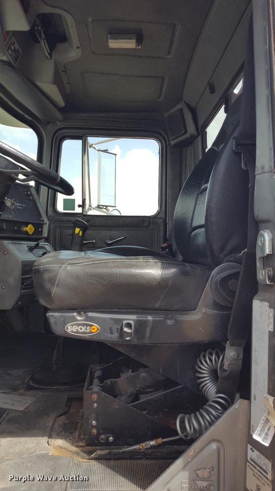 image for item EI9663 2004 Mack RD690SX flatbed winch truck