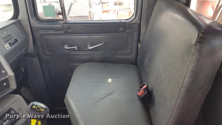 image for item EI9663 2004 Mack RD690SX flatbed winch truck