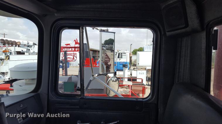 image for item EI9663 2004 Mack RD690SX flatbed winch truck