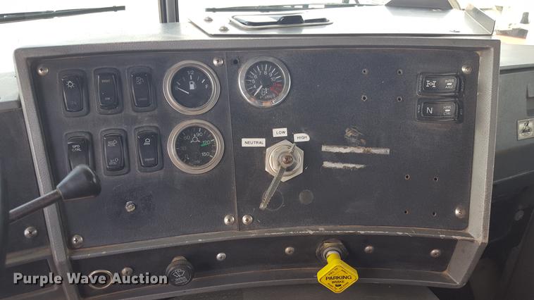 image for item EI9663 2004 Mack RD690SX flatbed winch truck