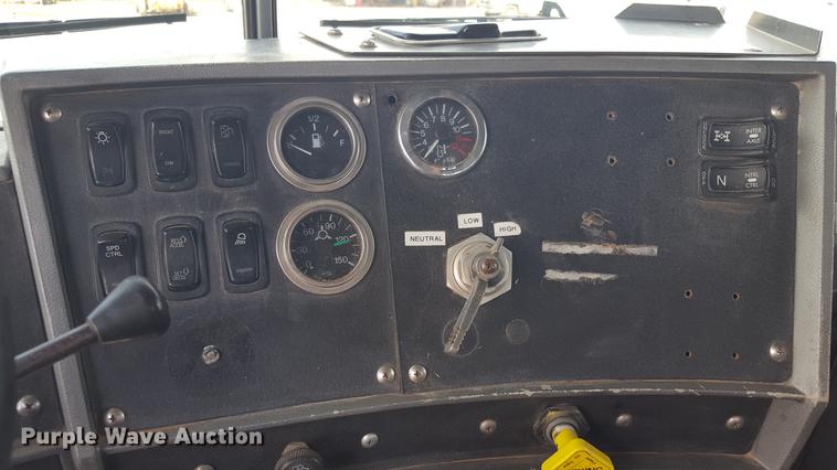 image for item EI9663 2004 Mack RD690SX flatbed winch truck