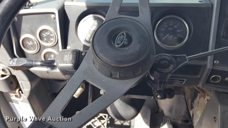 image for item EI9663 2004 Mack RD690SX flatbed winch truck