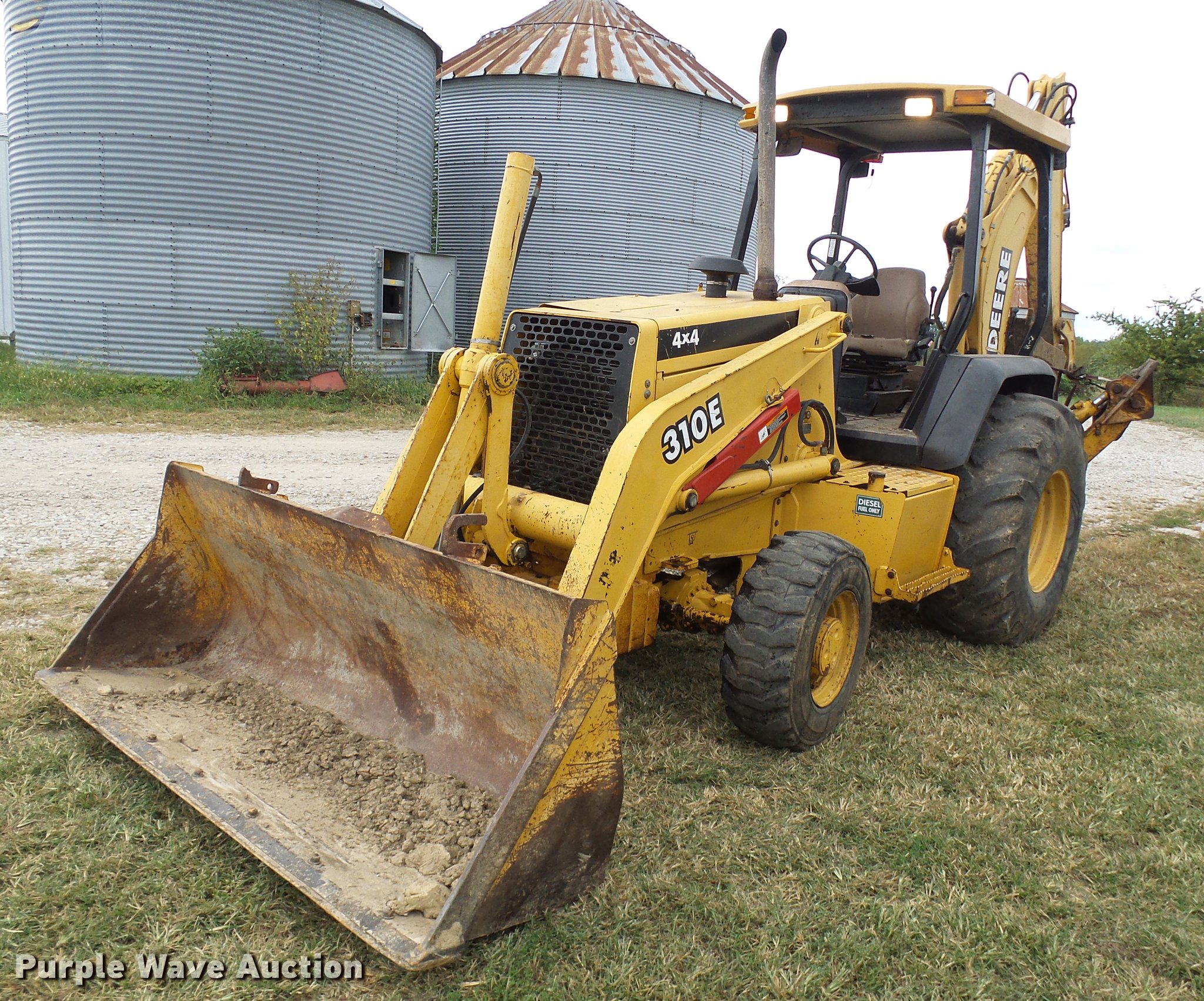 1999 John Deere 310E backhoe in Fulton, MO Item DE5267 sold Purple Wave