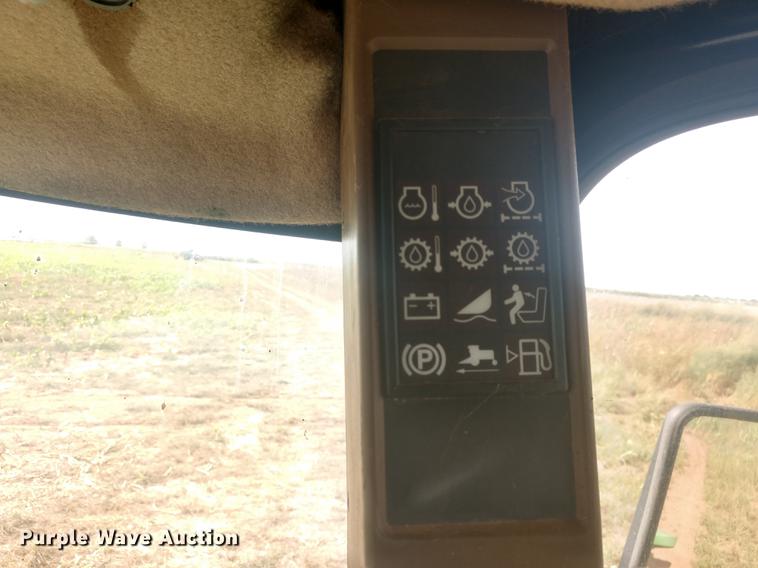 image for item DE6472 2009 John Deere 4995 windrower