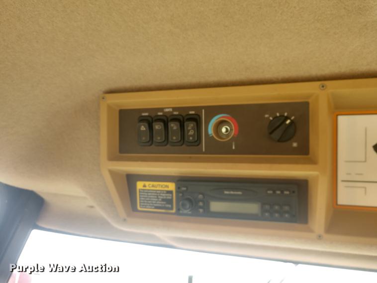 image for item DE6472 2009 John Deere 4995 windrower