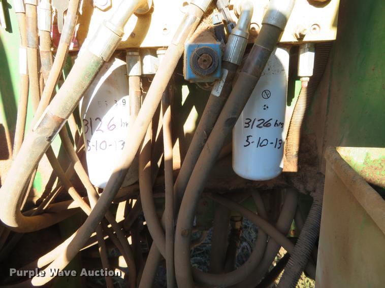 image for item DE6472 2009 John Deere 4995 windrower