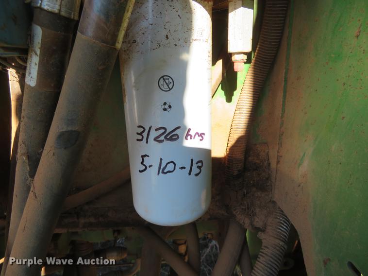 image for item DE6472 2009 John Deere 4995 windrower