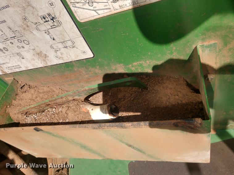 image for item DE6472 2009 John Deere 4995 windrower