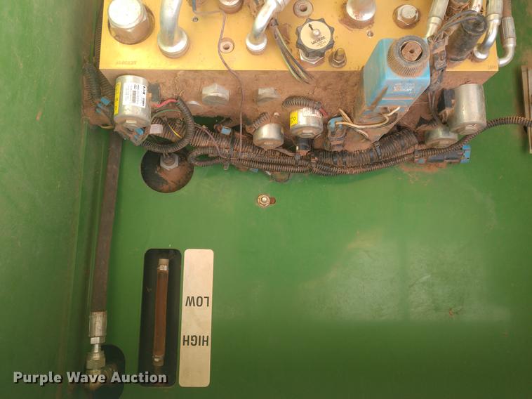 image for item DE6472 2009 John Deere 4995 windrower