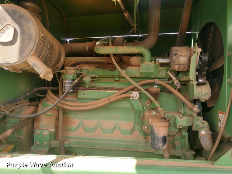 image for item DE6472 2009 John Deere 4995 windrower