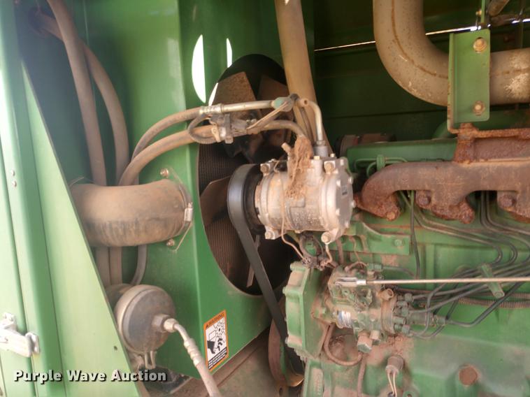 image for item DE6472 2009 John Deere 4995 windrower