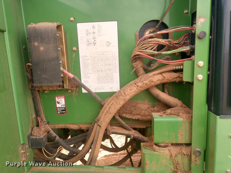 image for item DE6472 2009 John Deere 4995 windrower