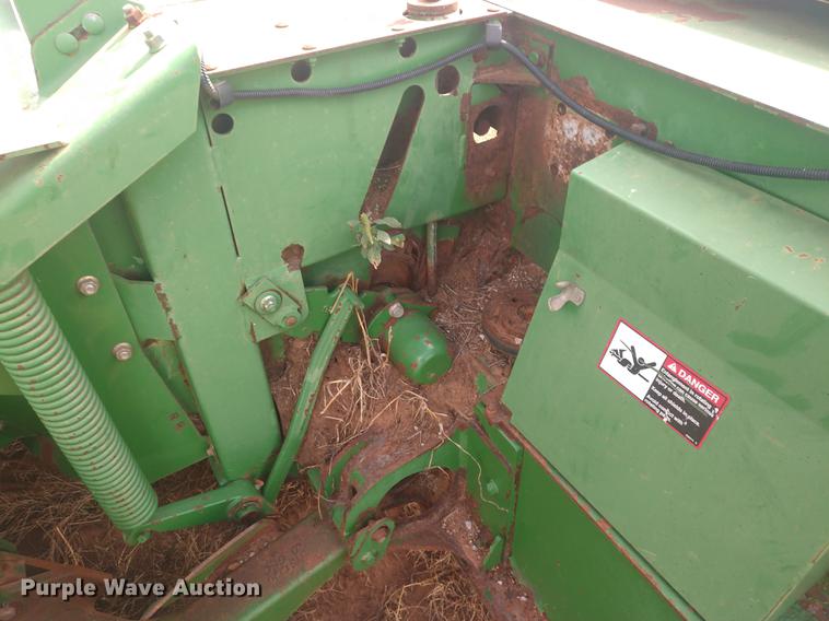 image for item DE6472 2009 John Deere 4995 windrower