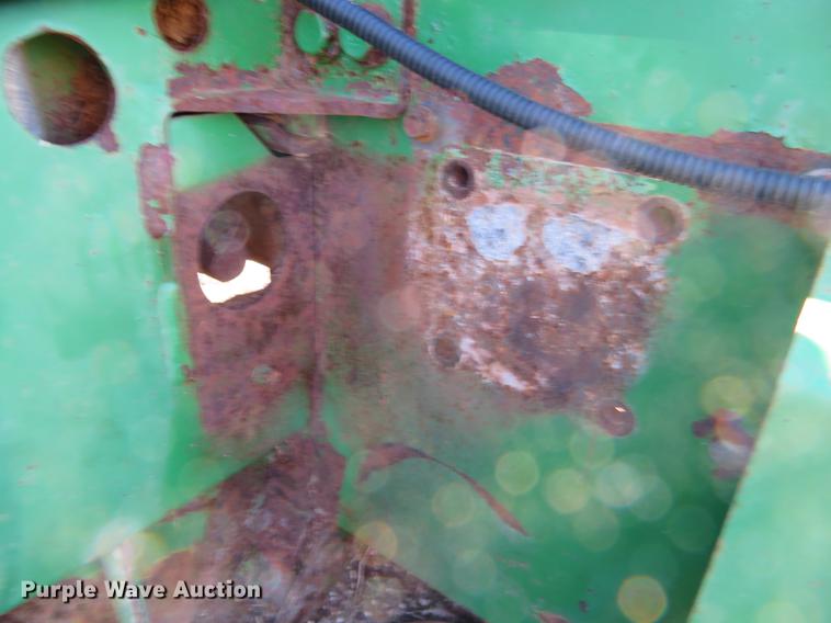 image for item DE6472 2009 John Deere 4995 windrower