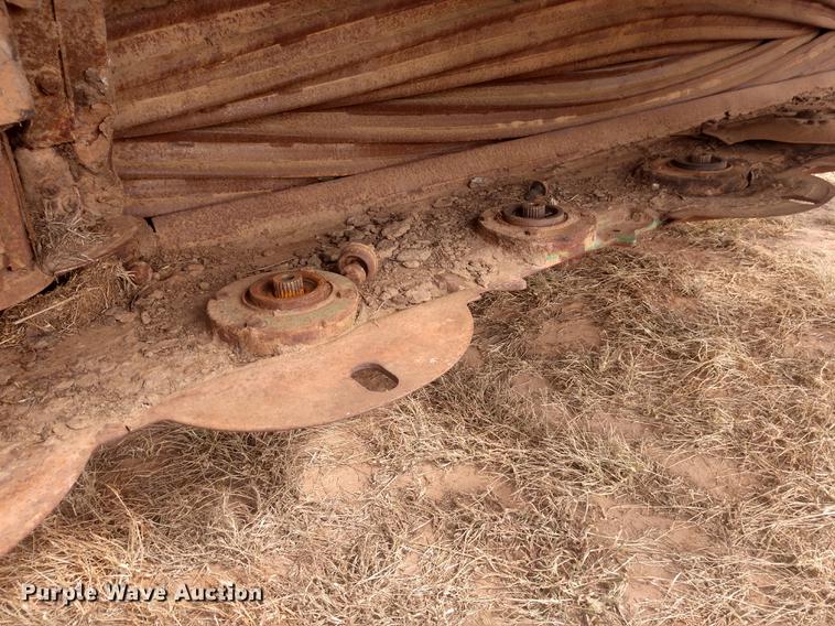 image for item DE6472 2009 John Deere 4995 windrower